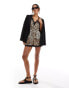 Фото #1 товара Miss Selfridge satin lace trim tie front playsuit in animal print