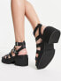 ASOS DESIGN Highway chunky mid heeled sandals in black