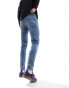 ASOS DESIGN skinny jeans in tinted light washed blue