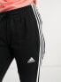 Фото #2 товара adidas Sportswear essentials 3 stripes joggers in black and white
