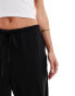 Фото #2 товара ASOS DESIGN Petite satin pull on trouser in black