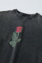 Faded t-shirt with rose