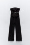 Pleated belted contrast jumpsuit
