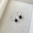 Round silver earrings with Onyx
