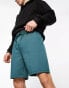 ASOS DESIGN smart slim shorts in green scuba