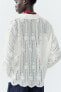 Semi-sheer shirt with cutwork embroidery