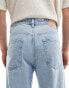 Фото #4 товара Pull&Bear ripped baggy jeans in mid blue