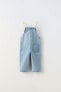 Contrast denim dungarees with buckles