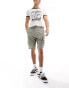 Фото #2 товара ASOS DESIGN skater fit cargo shorts in textured check print