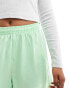 Фото #4 товара adidas Originals three stripe sprinter shorts in pastel green