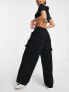 Фото #2 товара ASOS DESIGN Petite oversized cargo trousers in washed black