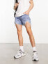 ASOS DESIGN denim shorts in lightwash with rip detail and raw hem in shorter length