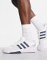 adidas Originals Courtic trainers in white and navy