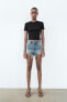 TRF CURVED HIGH-WAIST RIPPED DENIM SHORTS