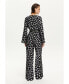 Фото #5 товара Women's Printed V-Neck Belted Jumpsuit