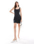 Фото #1 товара New Look mini slip dress in black spot