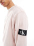 Calvin Klein Jeans badge crew neck sweatshirt in sepia rose