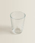 Raised design tumbler