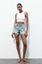 Trf ripped mid-rise denim shorts