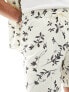 ASOS DESIGN co-ord seersucker swim shorts in beige with black floral print