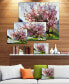 Фото #2 товара Designart Tree With Spring Flowers Floral Art Canvas Print - 32" X 16"