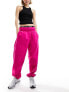 Nike mini swoosh oversized fleece joggers in pink - BPINK