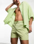 Фото #1 товара ASOS DESIGN skinny shorts in shorter length in green