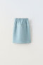 Plush skirt with seams