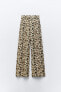 Linen-blend animal-print wide-leg trousers
