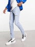 Фото #1 товара ASOS DESIGN skinny jeans in light wash blue with thigh rip