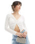 Фото #1 товара ONLY cropped long sleeve v-neck top in white pointelle