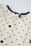 Textured polka dot blouse with rhinestones