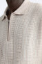 Textured weave quarter-zip polo shirt
