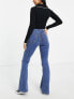 Topshop Petite Jamie flare jeans in mid blue