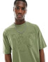 ASOS DESIGN oversized t-shirt in khaki with front distressed applique print