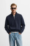 HIGH NECK QUARTER-ZIP SWEATER