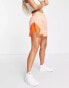 Jordan Essential skort in crimson bliss and orange