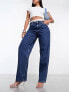 Фото #9 товара Calvin Klein Jeans 90's straight jeans in mid wash