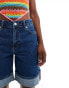 ASOS DESIGN denim bermuda shorts with turn up hem in wash blue