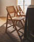 Rattan and wood folding chair