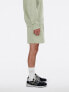 New Balance Iconic collegiate fleece short 7" in green