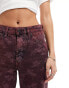 Wrangler flared jeans in burgundy floral