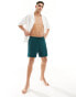 Фото #3 товара ASOS DESIGN swim shorts in mid length in forest green