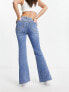 Фото #3 товара Urban Revivo split hem twisted hem flared jeans in blue