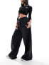 Фото #1 товара Puma Dare To woven parachute pants in black