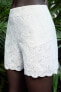 Bermuda shorts with cutwork embroidery