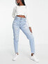 Фото #1 товара Levi's high waisted distressed mom jean in light wash blue
