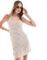 ASOS DESIGN holiday knitted halter mini dress with 3D flowers in cream Бежевый, M - EU 40-42 - фото #1