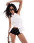 Фото #1 товара Mango Selection mini knitted co-ord shorts in black