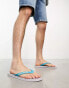 Jack & Jones floral logo flip flops in blue